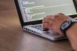 Developer deploying one small change, showing why we ship small and often